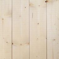 Façade à bardage vertical en bois d’épicéa / de sapin naturel