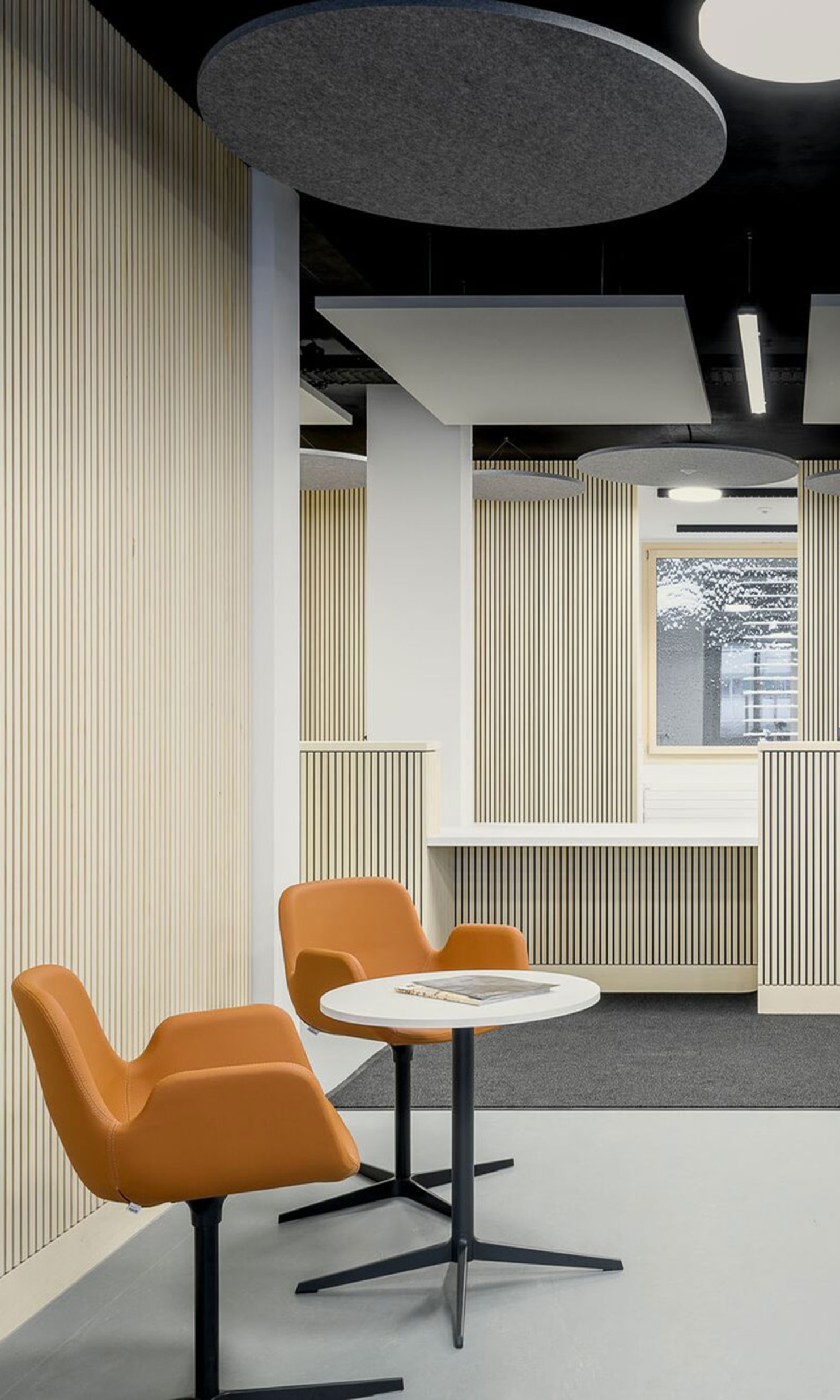 Waiting area with timber interior finishing in Mosnang health centre