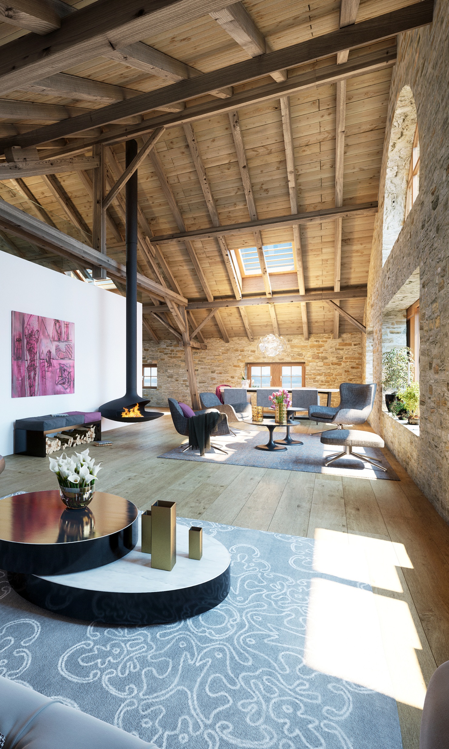 Living area of the Romanshorn granary conversion finished with a fireplace and seating to create a pleasant ambience