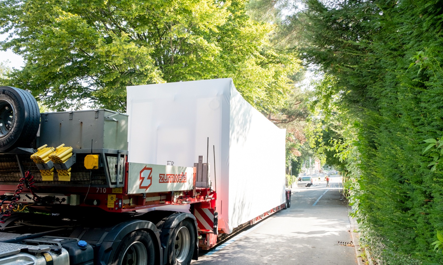 The ZM10 timber modules are transported by road on a low loader.