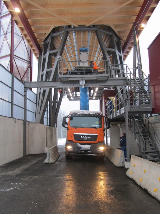 Loading by belt weigher at the silo hopper at the gritting silo facility Haigerloch Germany