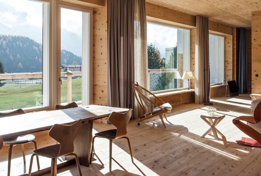 The large windows provide wonderful views of the mountain landscape.