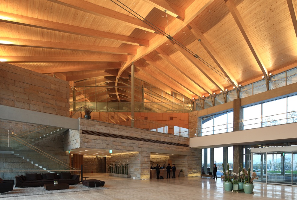 Interior of the Hillmaru golf clubhouse with a huge entrance area bathed in light