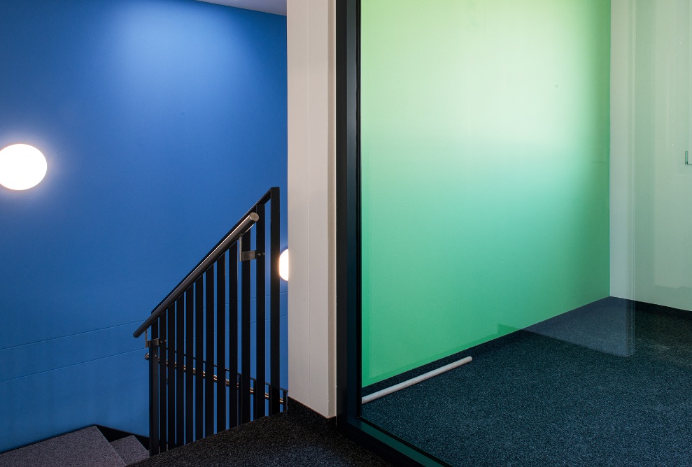 Colourful interiors in the Lausanne transport authority’s temporary office building