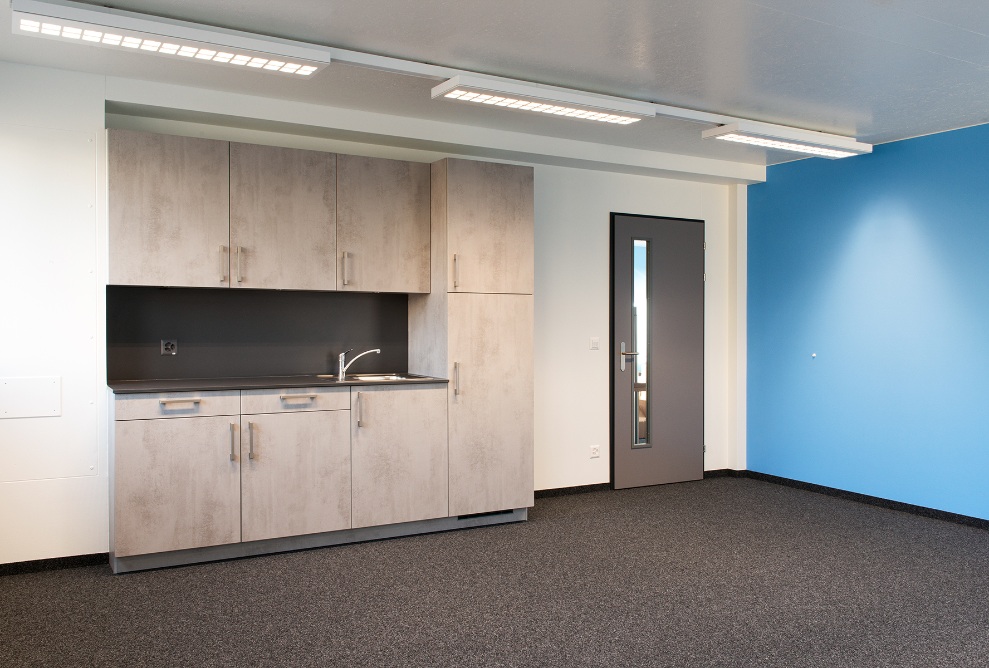 Space with kitchen facilities in the Lausanne transport authority’s temporary office building.