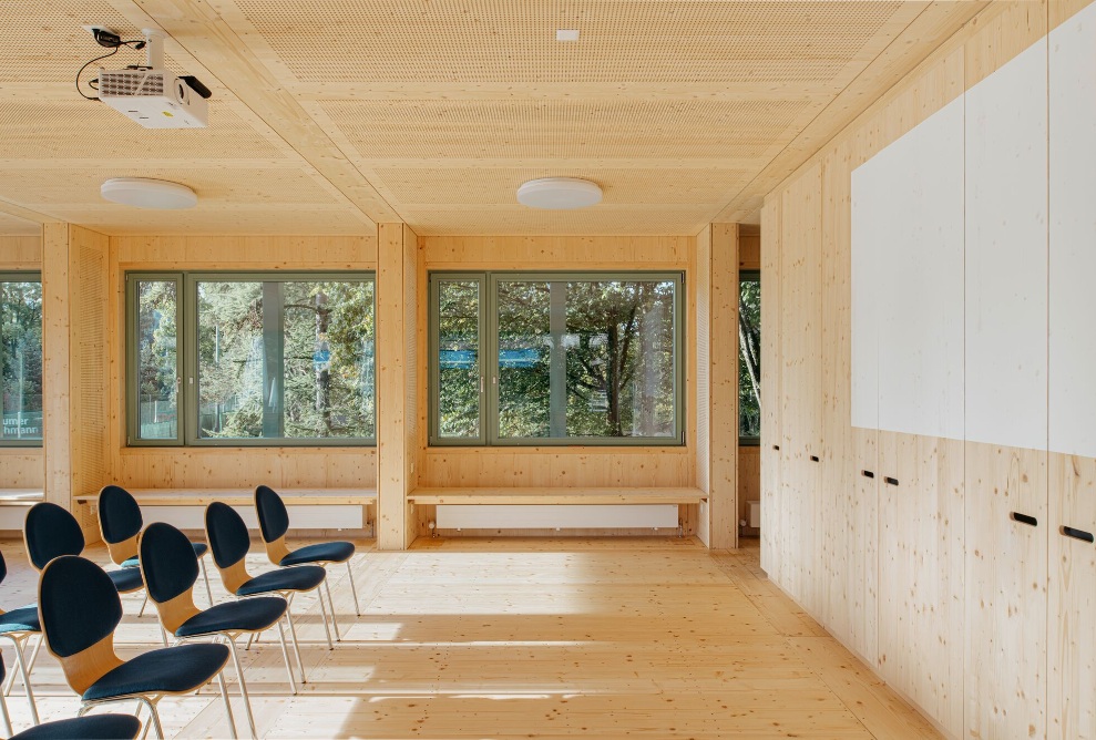 Interior shot of the Sportfeld pavilion with timber fittings.