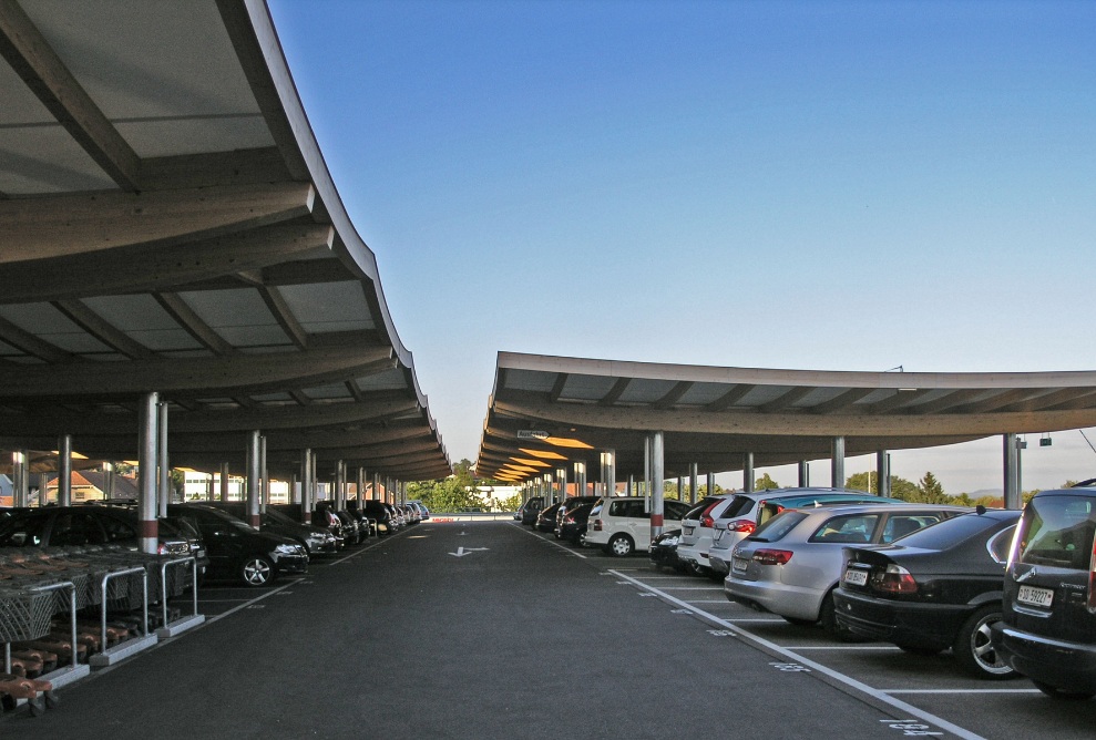 Photograph taken amid The Umbrellas car park roofing in Langendorf